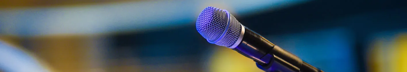 A microphone with a blurred background