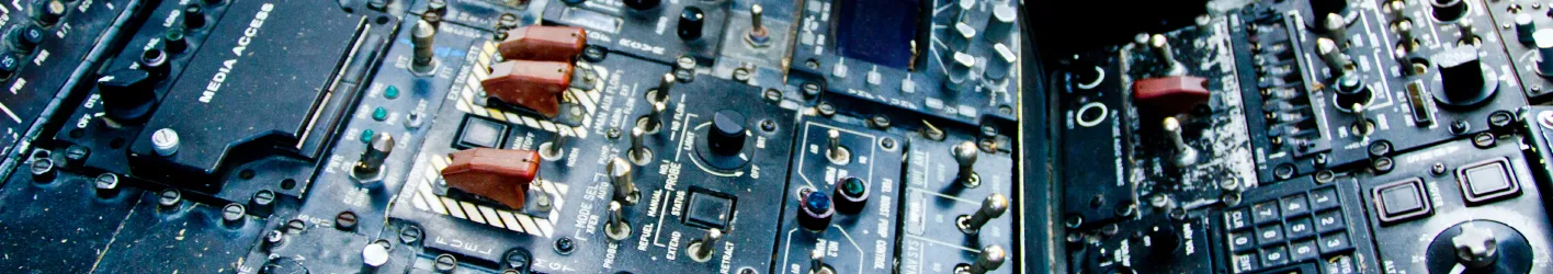 Picture of controls in a jet cockpit.